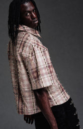 Guapi Vintage Rose Studded Plaid Shirt featuring a rose plaid pattern, metal toggle closures, studded trim detailing, pointed collar, short sleeves, and a relaxed streetwear fit.