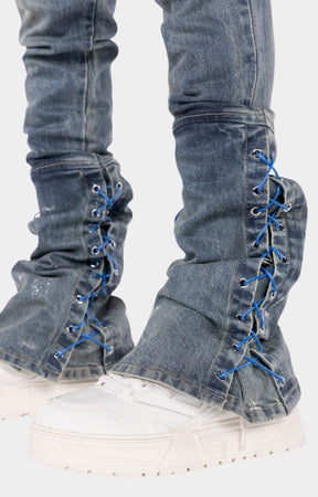 Slim fit cargo denim jeans with extended stacked hem construction.