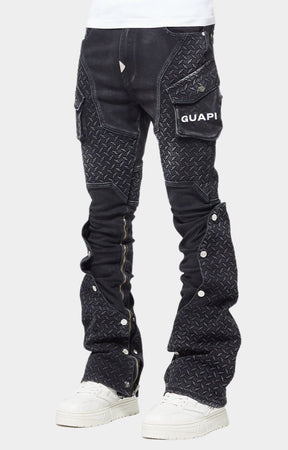 Oversized cargo pockets with distressed flaps on Guapi denim.