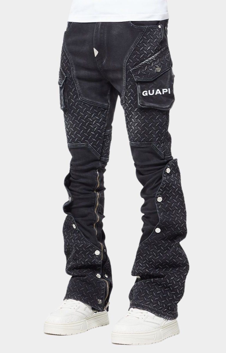 Oversized cargo pockets with distressed flaps on Guapi denim.