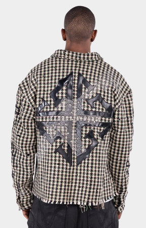 Back view of GUAPI Still A Threat statement overshirt with appliqué graphics.