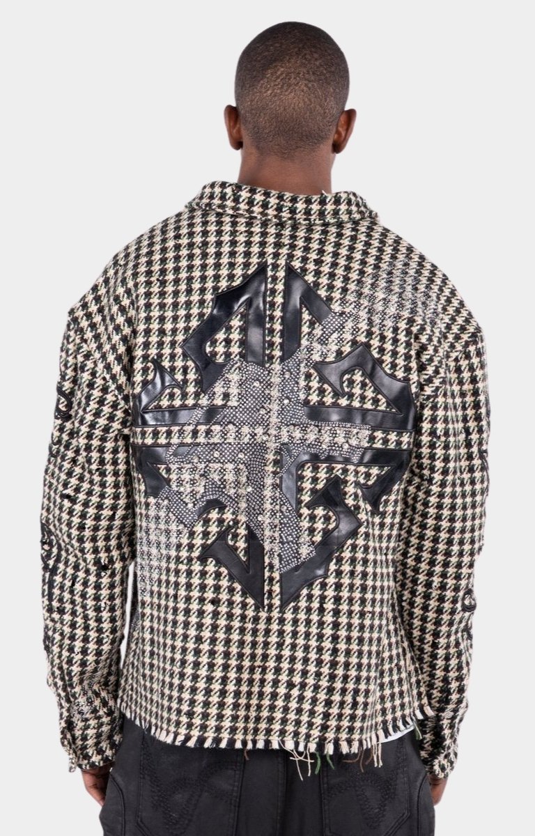 Back view of GUAPI Still A Threat statement overshirt with appliqué graphics.