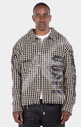 GUAPI Still A Threat rhinestone shirt jacket front view with textured patterned fabric.