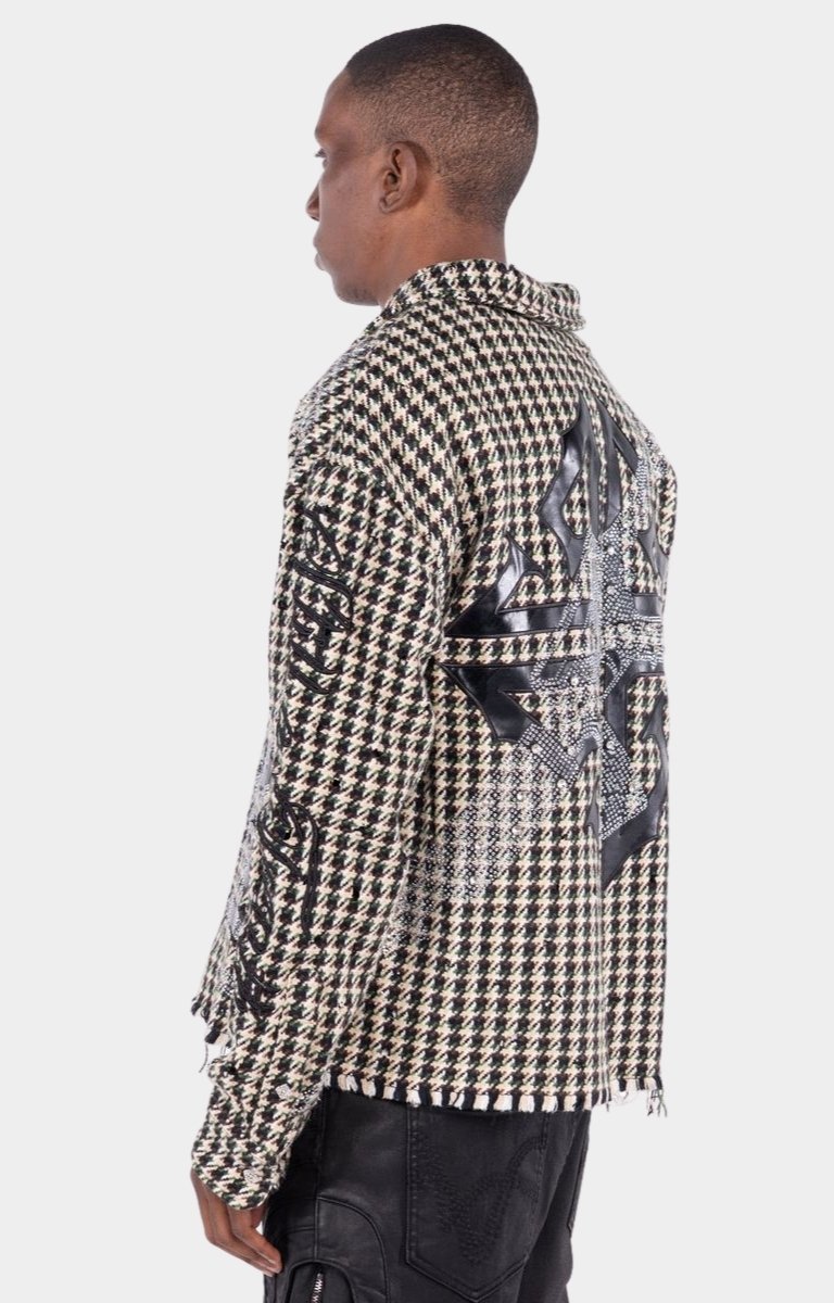 Side profile of GUAPI Still A Threat structured relaxed fit overshirt.