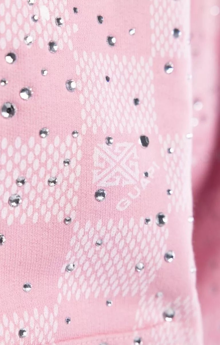 Detailed splatter print texture on GUAPI streetwear hoodie.