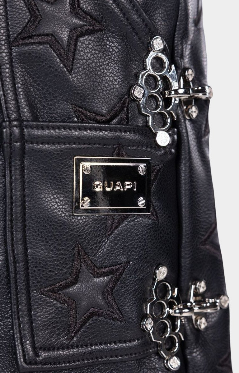 Textured leather fashion shorts featuring embossed star detailing.
