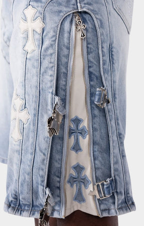 Utility-inspired denim shorts featuring side buckle strap accents