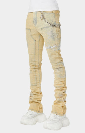 Close-up of rhinestone star and crescent embellishments on Guapi denim
