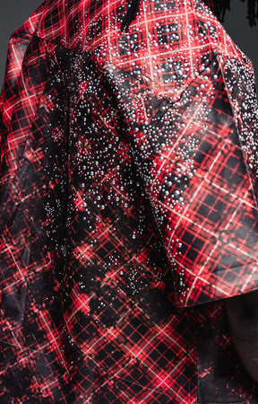 Close-up of plaid, burn-effect and hardware details on Guapi Inferno Leather Shirt.
