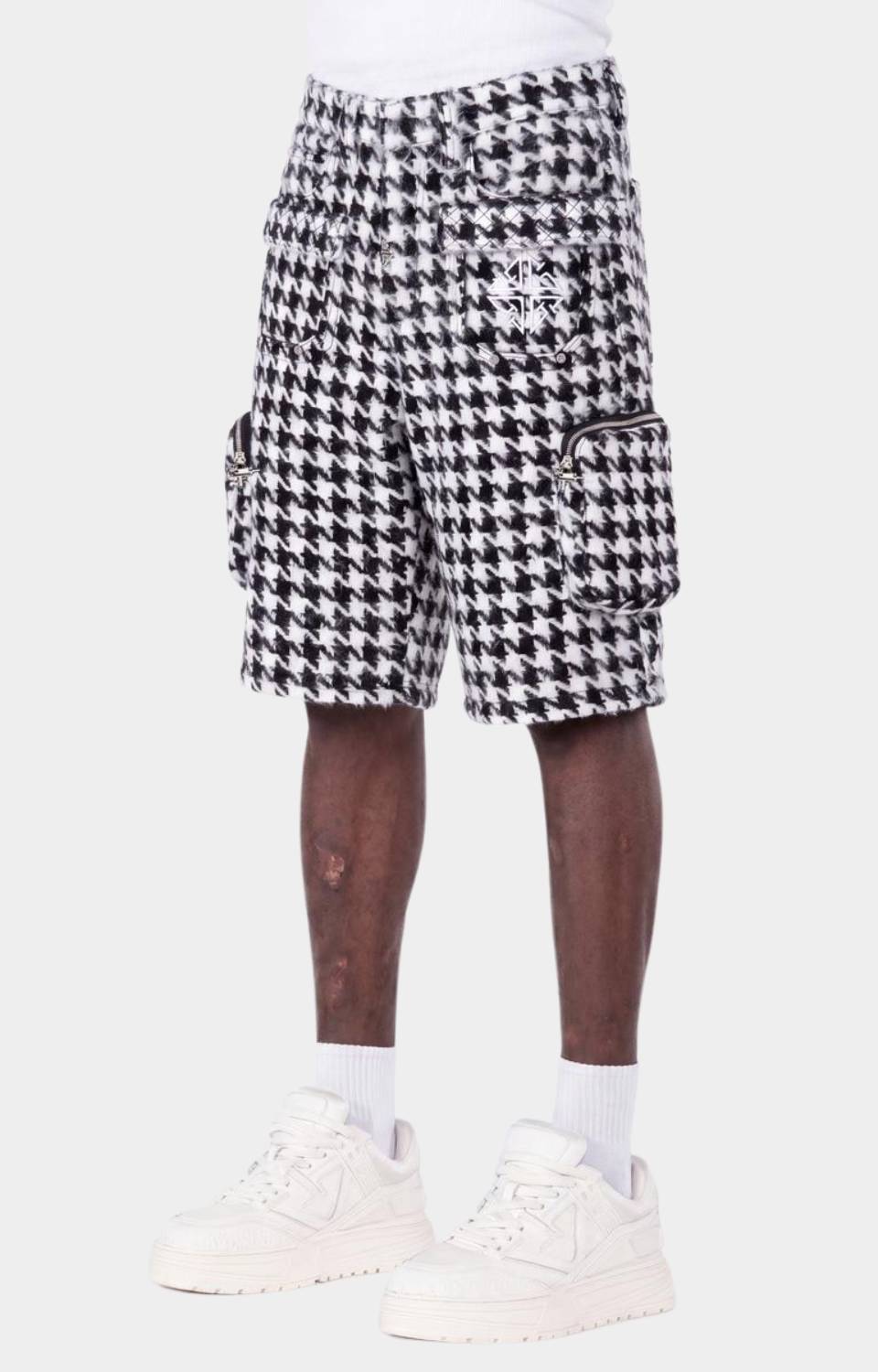 Side view of Guapi White Houndstooth Furry Cargo Shorts.