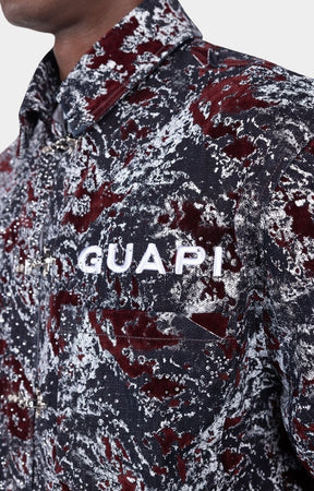 Embroidered chest logo detail on Guapi Wine Red Velvet Shirt.