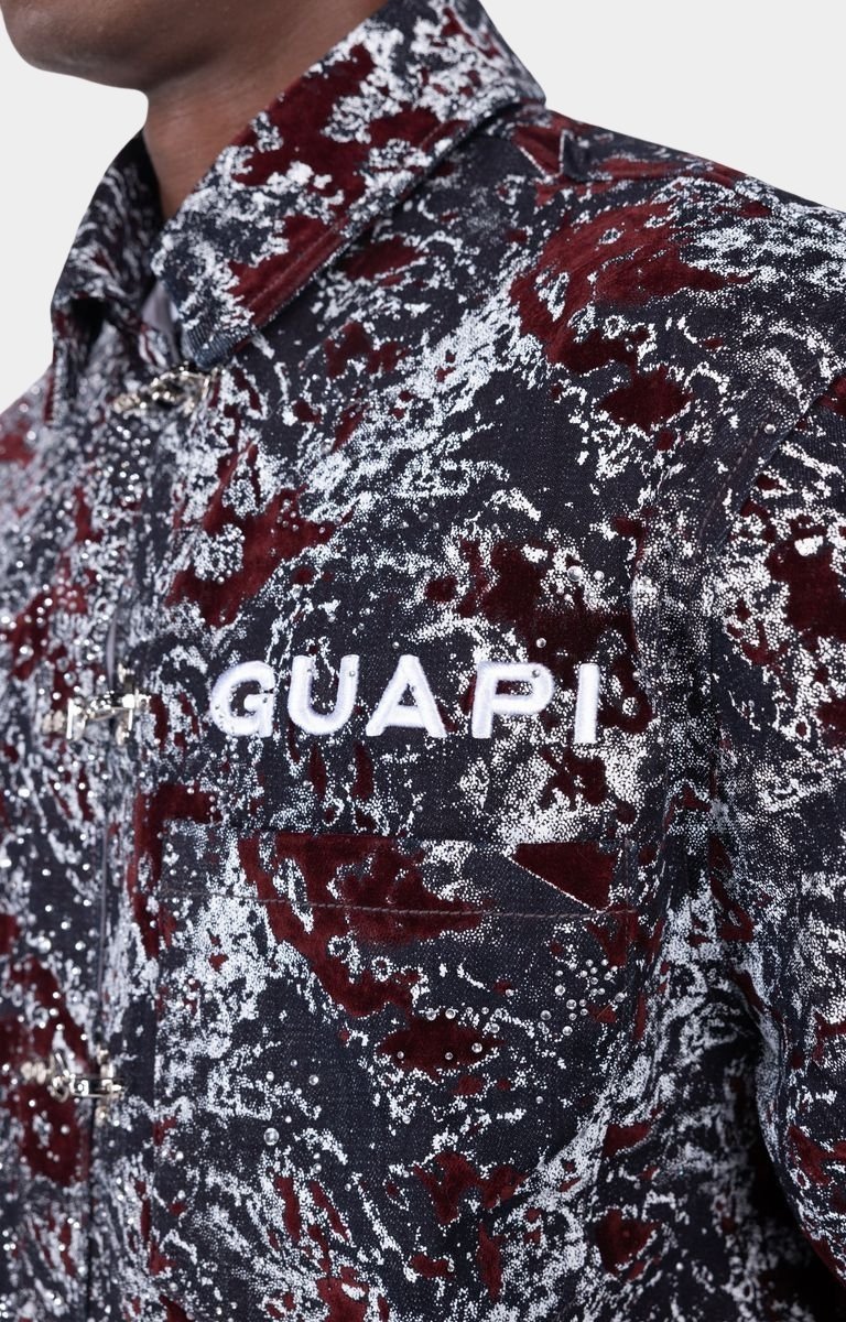 Embroidered chest logo detail on Guapi Wine Red Velvet Shirt.
