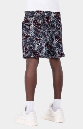 Designer wine red shorts featuring sophisticated velvet craftsmanship.