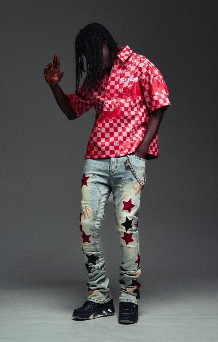 Leather star appliqué detail on Guapi Wine Red Vintage Stars Denim.
