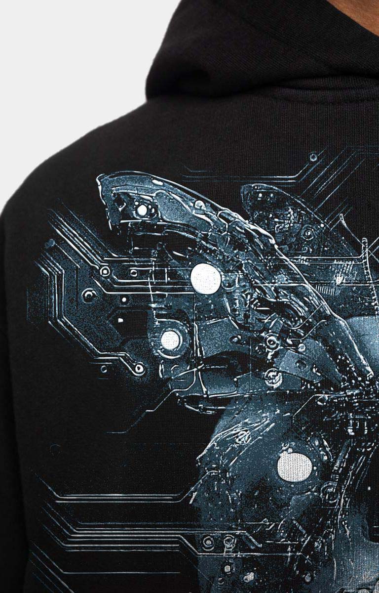 Close-up of GUAPI metallic butterfly graphic.