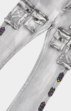 Premium washed grey denim texture and Gunzinii hardware detail close-up. 