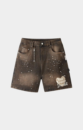 Hyde Park after work wear crystal studded with paint splatter black twill shorts front view. 