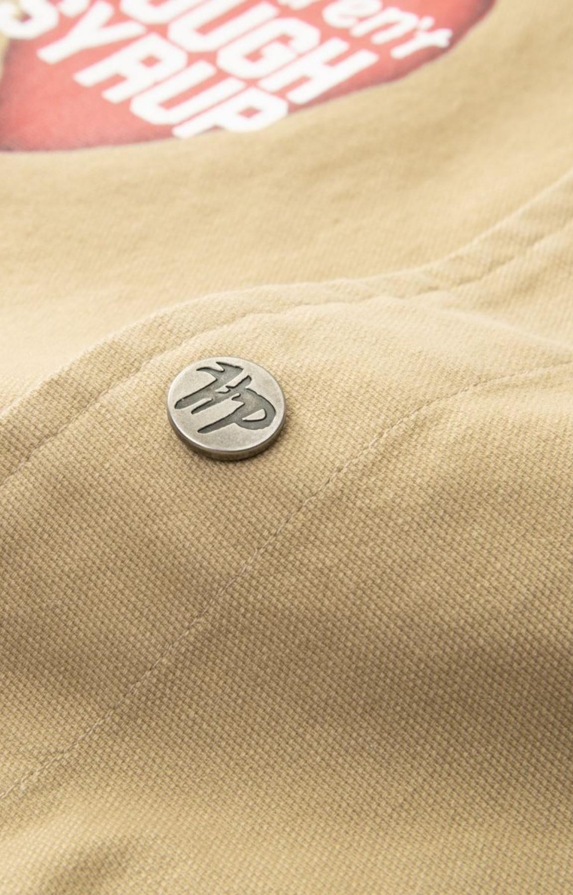 Graphic details on Hyde Park x ALOCS Mechanic Workwear Shirt in Khaki.