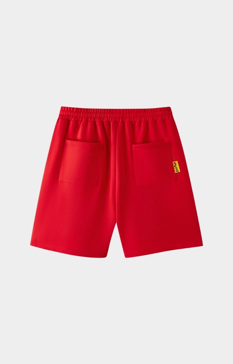 White angled stripe panel detail on red shorts.