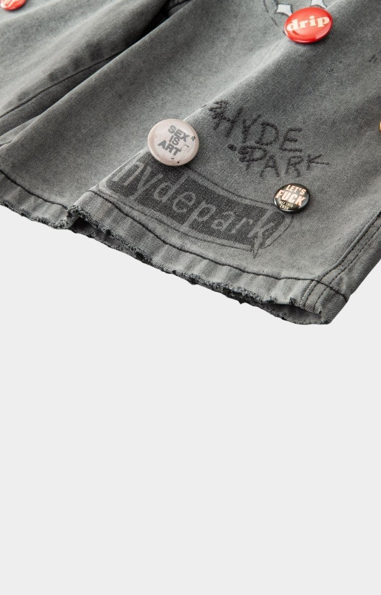 Gray denim jacket with 'Hyde Park' branding and buttons. 