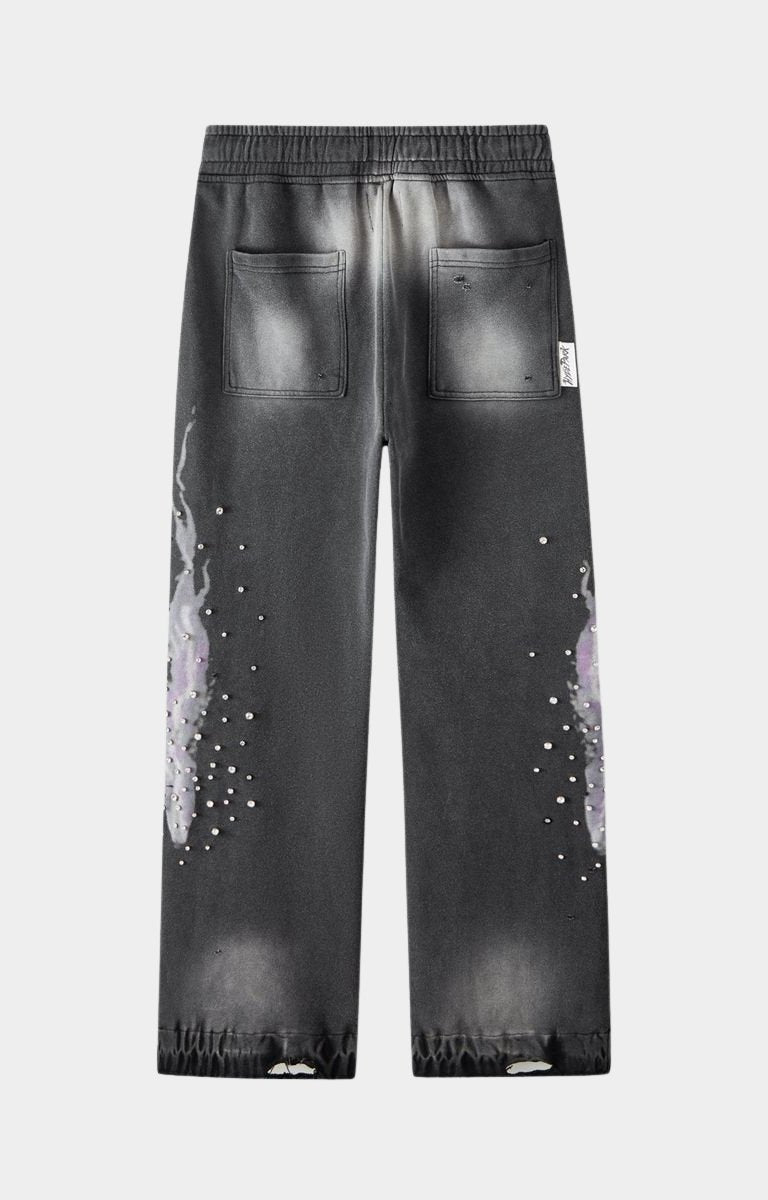 Back view of Hyde Park Electric Panther jogger in black with distressed pocket details and metallic studs on both legs. 