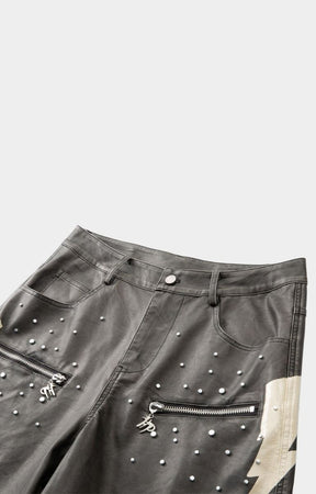Faux leather texture detail on hyde park  black moto racer shorts with studs and 2 front pockets with hyde park emblem. 