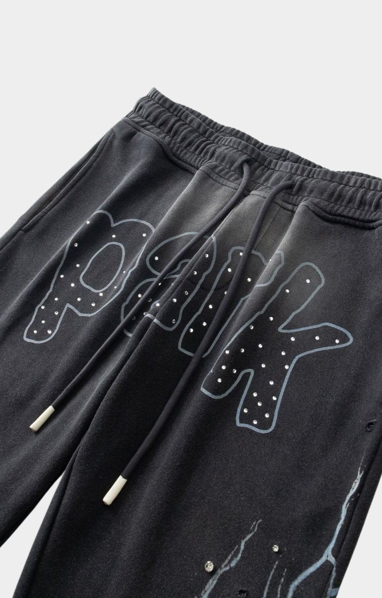 Pocket design close-up of Hyde Park Throw Back Jogger with logo print at front embellished with rhinestones.