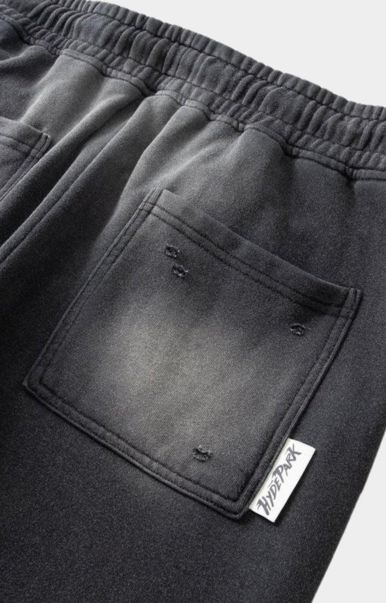 Pocket design close-up of Hyde Park Throw Back Jogger. distressed pockets with hyde park tag. 