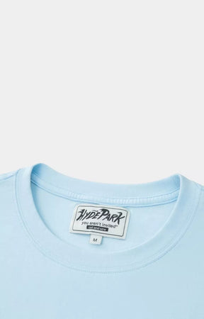 Detailed view of Hyde Park Stencil Heart oversized tee crewneck. 