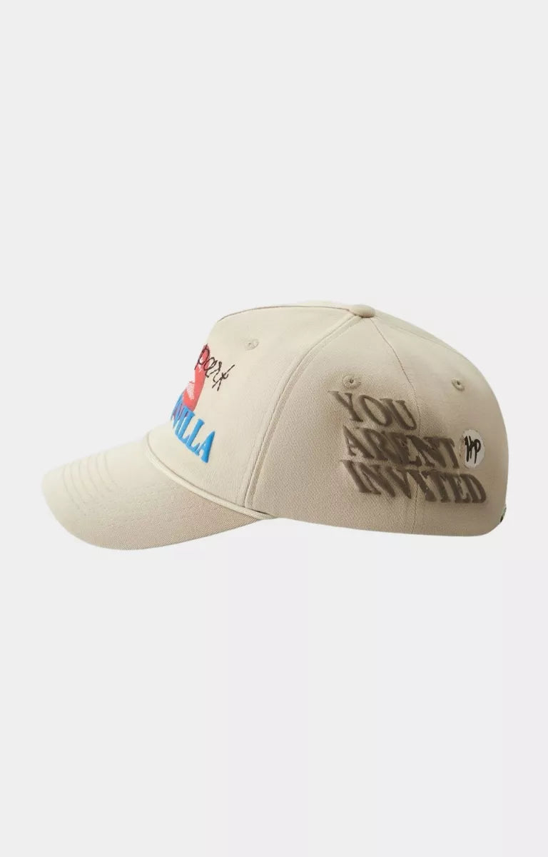Side profile of Hyde Park Luxury Resort light khaki cotton cap.