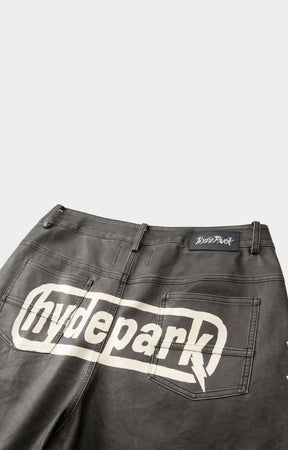 Moto panel construction detail on shorts back view with hyde park printed at back. 