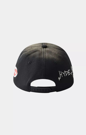 Back view of Hyde Park Over Spray black urban fashion cap.