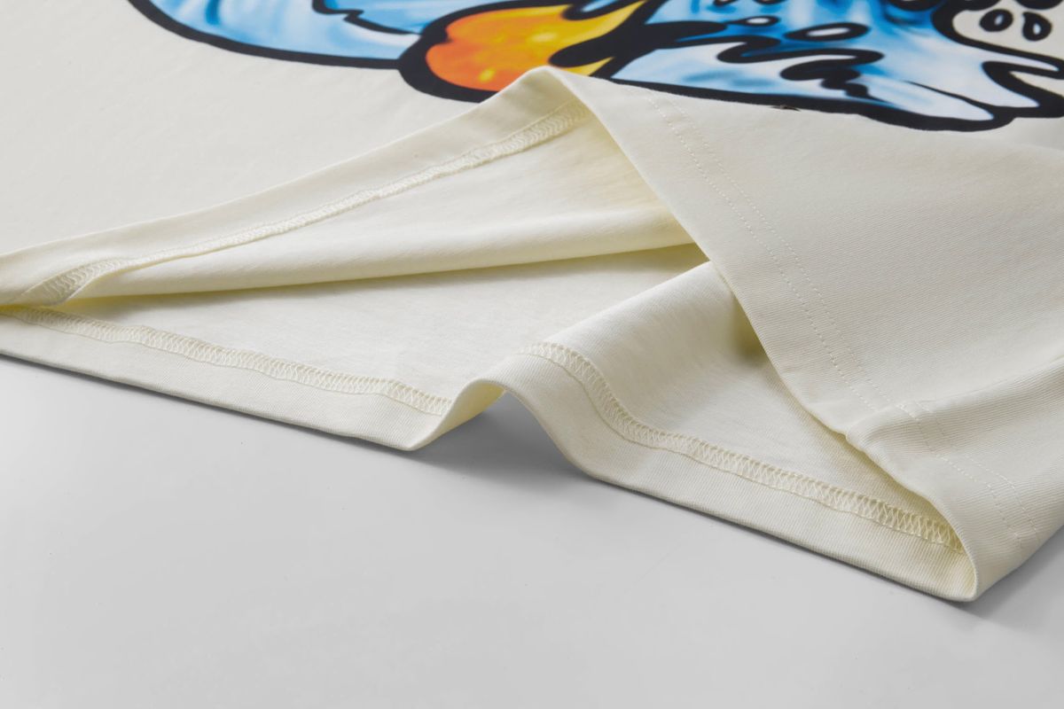 White fabric with a colorful graphic design on a light gray background