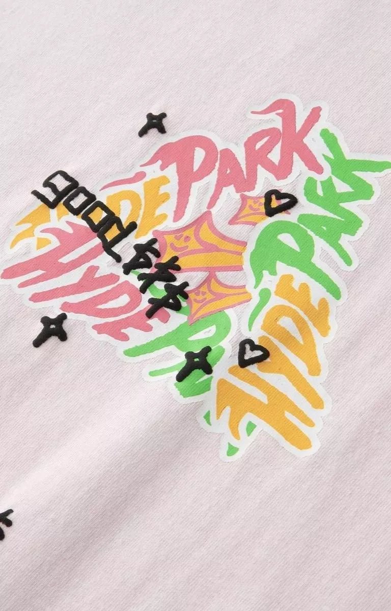 Pink Hyde Park oversized streetwear t shirt featuring layered graphic artwork.