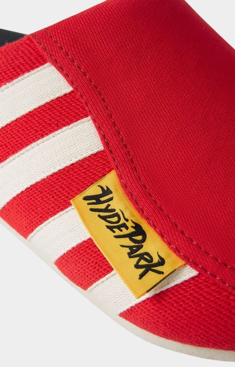 Reinforced edge stitching detail on hyde park red and white slides.