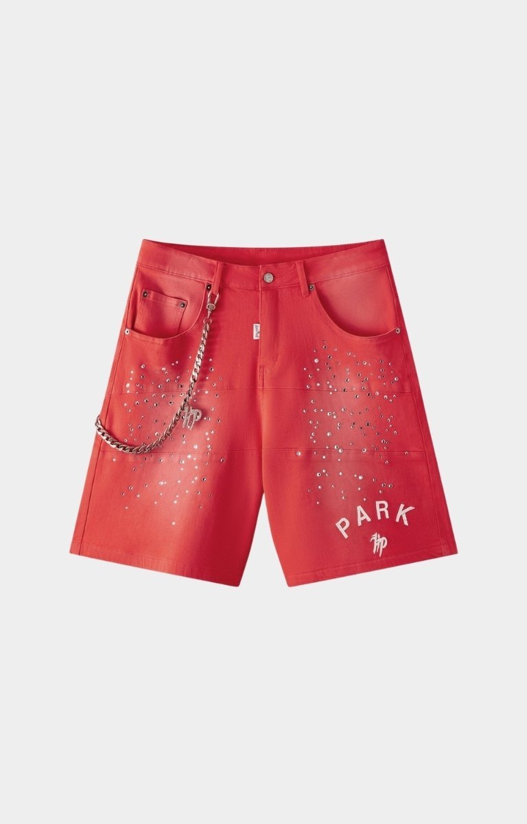Hyde Park red studded denim shorts front view with rhinestones and metal chain. 
