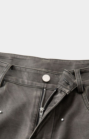 Waistband and button closure detail with front zip closure on hyde park moto racer shorts-black. 