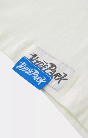 Close-up detail of Hyde Park luxury oversized white t-shirt fabric.