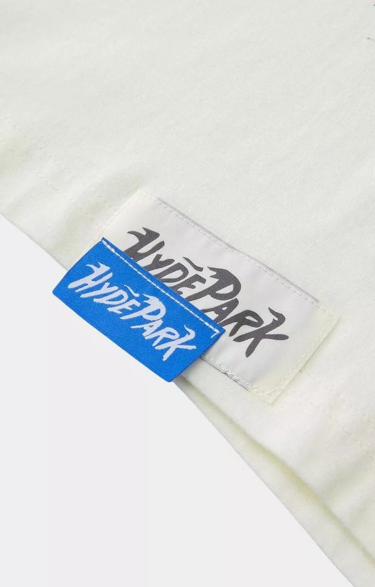 Close-up detail of Hyde Park luxury oversized white t-shirt fabric.