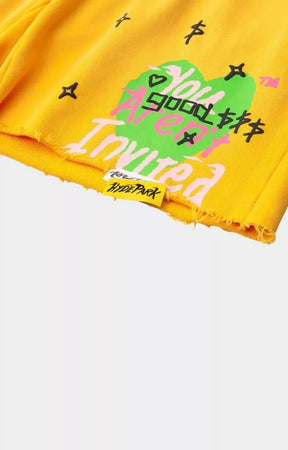 Close-up detail of Hyde Park From The Archive cotton shorts in yellow.