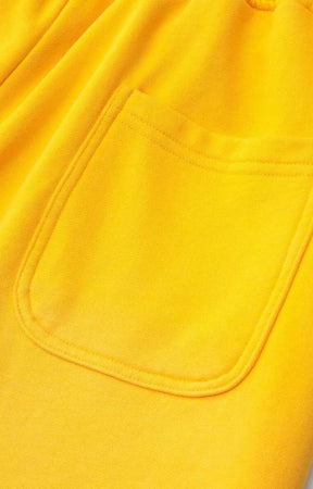 Premium yellow fashion shorts designed for modern streetwear styling.