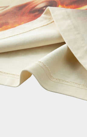 Close-up of beige fabric with a colorful pattern in the background