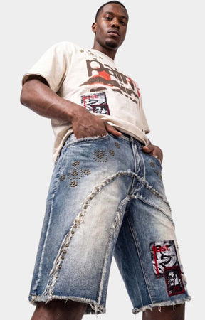 Stud embellishment detail on Makobi Dolore Pain Denim Shorts.