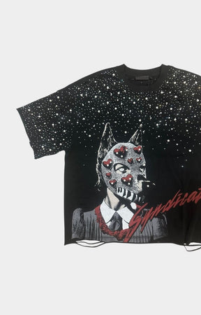 Close-up of red Syndicate logo and masked dog artwork on cropped tee.