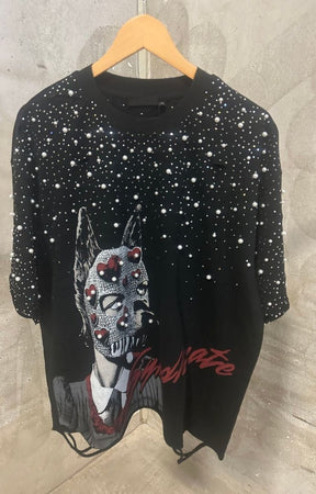 Detail shot of rhinestone and pearl embellishments on The Masque Black Cropped Tee.