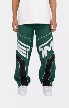 Men wearing hunter green streetwear track pants by EPTM