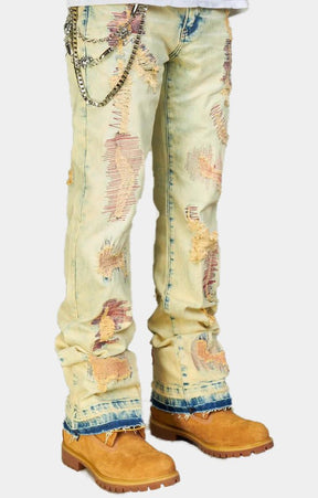 Chain accent detail on NME stacked streetwear jeans.