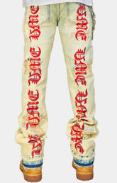 DISTRESSED STACKED JEANS WITH CHAIN ACCENT