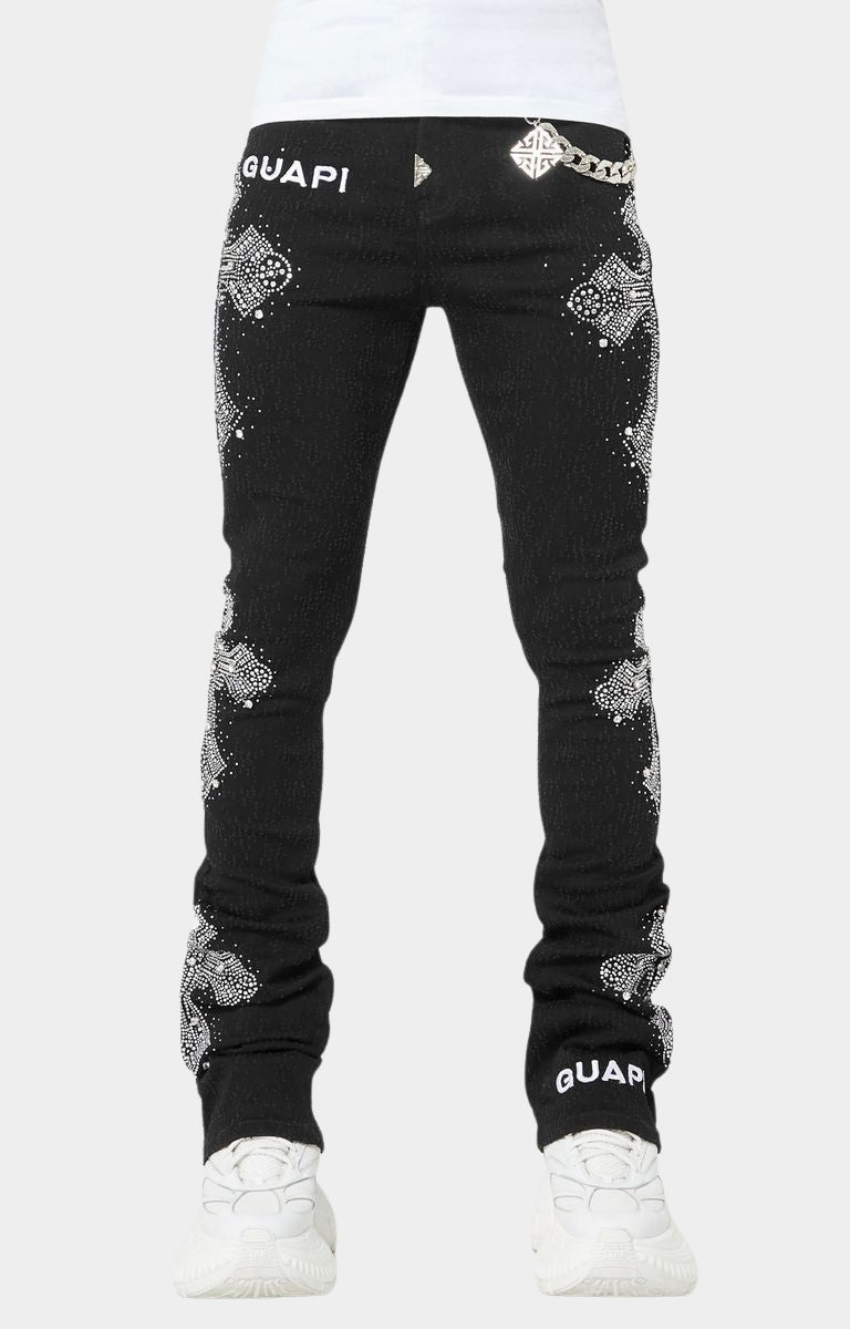 Front view of Obsidian Black Distressed Cross Denim stacked skinny jeans.
