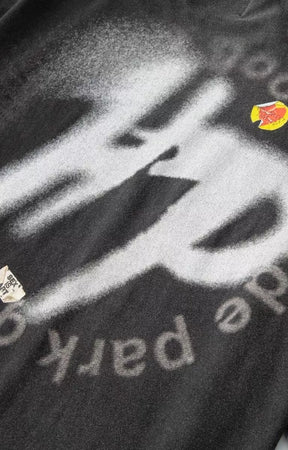 Detailed view of Over Spray Sticker Slap HP black t-shirt.
